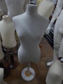 * fabric female upper body on wooden stand