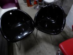 * 2 x black plastic bucket chairs