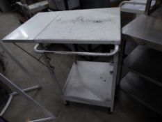 * white trolley on castors with pop up side ideal for clothing store or similar