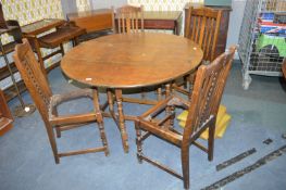 1930's Circular Oak Dining Table with Matching Cha