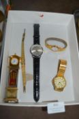 Wristwatches and a Miniature Grandfather Clock
