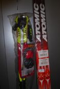 * brand new set of skies, brand atomic pro scate 184 and poles.