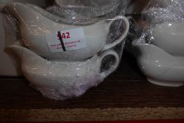 * Approx. 25 small white gravy boats