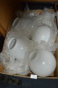 Four White Glass Globe Shades