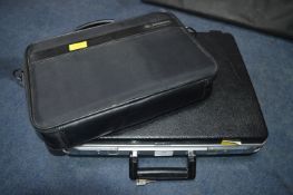 Delcie Briefcase and a Samsonite Laptop Bag