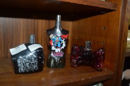 Three Empty Perfume Bottles