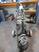 Golf Cart with Quantity of Clubs Including Slazenger, Wilson, Integra, and Titleist