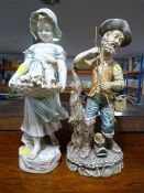 Two Ornamental Figurines; Fisherman, and Girl with Puppies