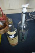 Two Large Empty Bottles (1 of Bells Old Scotch Whisky & 1 Vodka Bottle)