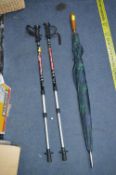 Pair of Hiking Sticks and an Umbrella