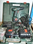 Bosch Drill and a Quantity of Batteries and Charg