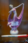 Art Deco Porcelain Figurine of a Dancer in a Magenta Dress