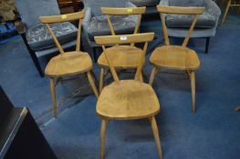Four Ercol Light Oak Dining Chairs