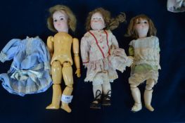 Three Bisque Headed Dolls