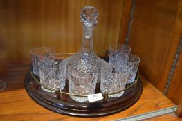Crystal Ships Decanter and Six Tumblers on a Brass Railed Wooden Stand