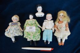 Five Miniature Bisque and Pottery Dolls