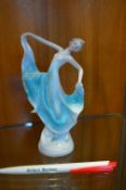 Art Deco Porcelain Figurine of a Dancer in a Turquoise Dress