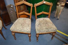 Pair of Victorian Carved and Inlaid Oak Chairs