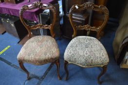 Pair of Carved Mahogany Dining Chairs with Upholstered Seats