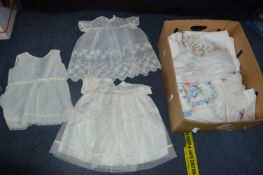 Three Vintage Child's Dresses and Embroidered Tablecloths and Linens