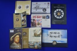 Seven Packs of Assorted UK Commemorative Coins, First Day Covers, etc.
