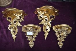 Two Pairs of Carved Gilt Wood Wall Shelves
