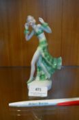 Art Deco Porcelain Figurine of a Dancer in a Green Dress
