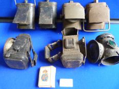 Four Blackout Bicycle Lamps, Three Damaged Carbide Lamps, and an AFS Matchbox Holder