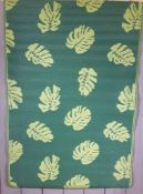 * 2 Outdoor green rugs, perfect to show off your garden furniture! or even to use on the beach!