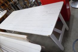 * white plank effect folding trestle style display table. 1800w x 800d x 720h