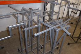 * 4 x silver mobile 4 way adjustable clothes rails