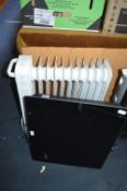Oil Filled Radiator and a Wall Mounted Heater