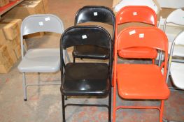 Five Folding Metal Chairs (2x Red, 2x Black, 1x Grey)