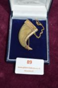 Gilt Mounted Toot Brooch