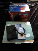 Polaroid Camera and a Canon Camera