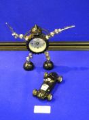 Two Small Novelty Clocks