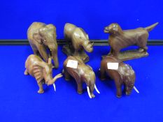 Wooden Ornaments; Elephants, Rhinoceros and a Dog