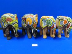Four Carved Wood Elephants with Beadwork