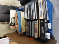 Small Crate of Singles and CDs