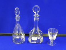 Two Glass Decanters and an Engraved Goblet