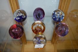 Seven Glass Paperweights