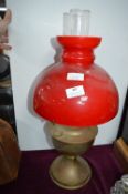 Brass Oil Lamp with Red Glass Shade