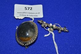 Two Brooches with Agate Cabochon and One Unmarked
