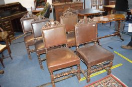 Six Carved Oak Dining Chairs with Leather Upholstery