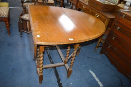 Edwardian Oak Oval Drop Leaf Dining Table with Barley Twist Legs