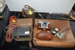 Diver Cast Iron Boot Weight, Vintage Cameras, Leather Satchel, etc.