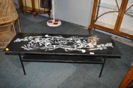 Retro Coffee Table with Floral Design and Metal Legs