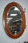 Oval Oak Hall Mirror with Coat Hooks