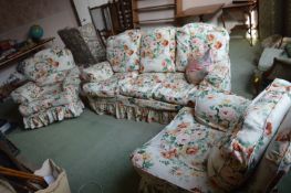 Three Seat Sofa and Two Matching Armchairs with Floral Covers