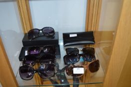 Seven Pairs of Sunglasses